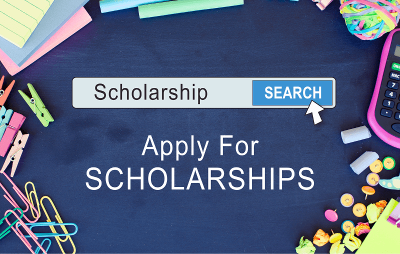 Apply for Scholarships with school supplies around writing